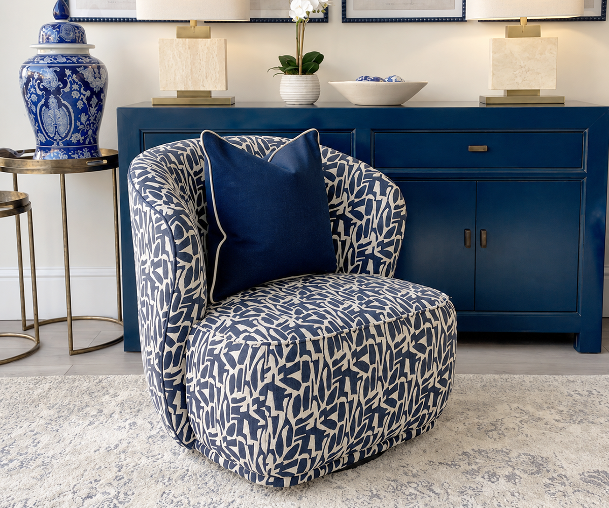 Clara Swivel Chair in Positano Ink
