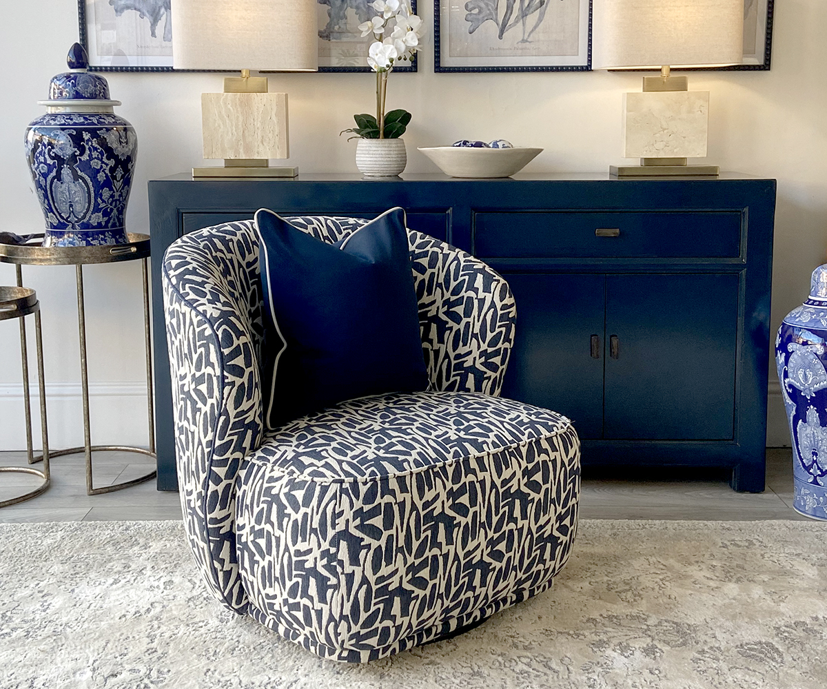 Clara Swivel Chair in Positano Ink